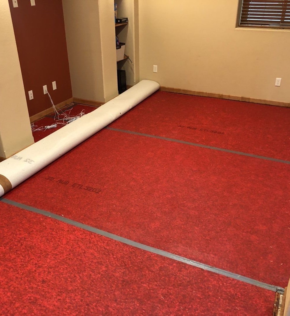 Removing padding beneath carpet due to vapor barrier